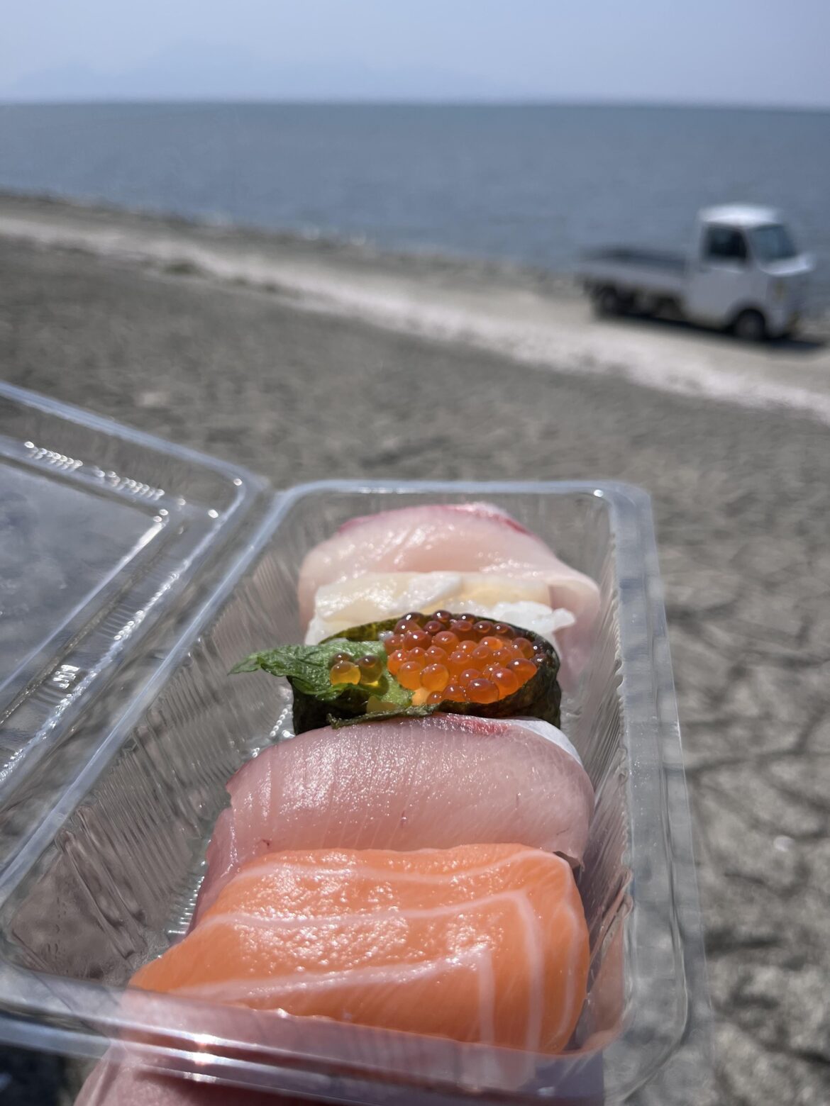 I’ll be eating $1 sushi while looking out at the sea.