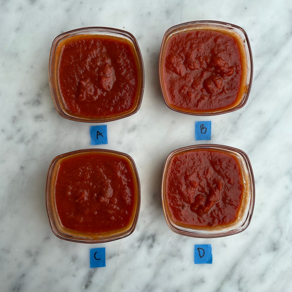 four glass bowls with pasta sauce in each bowl four glass bowls with pasta sauce in each bowl