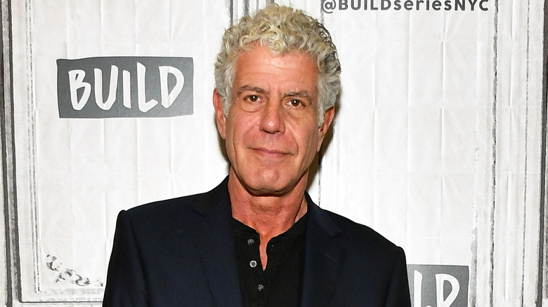 Anthony Bourdain posing at an event