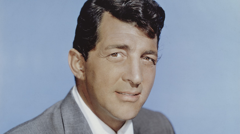 Dean Martin in gray blazer and white shirt
