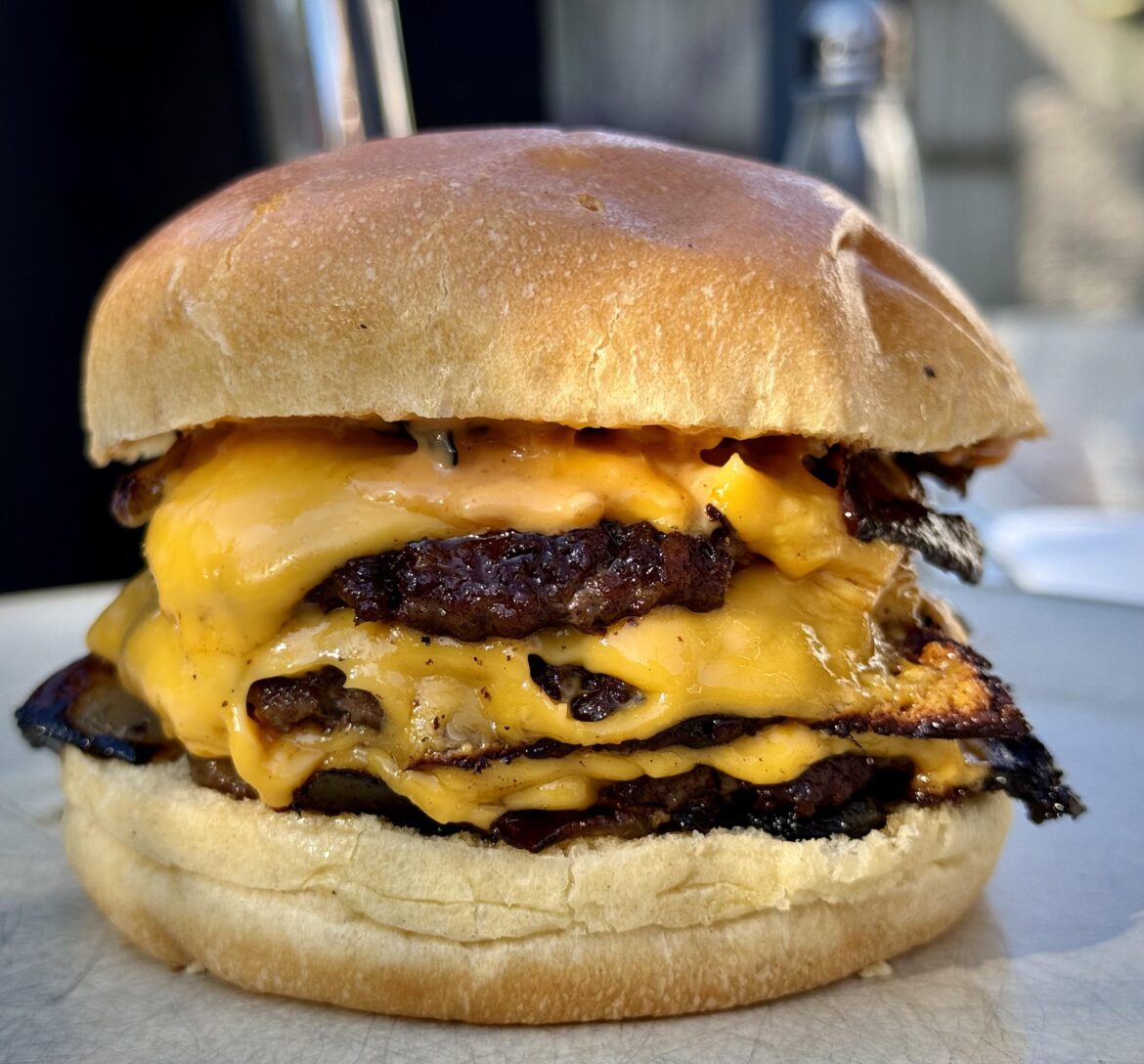 Triple Cheese Burger with slow cooked onions Triple Cheese Burger with slow cooked onions