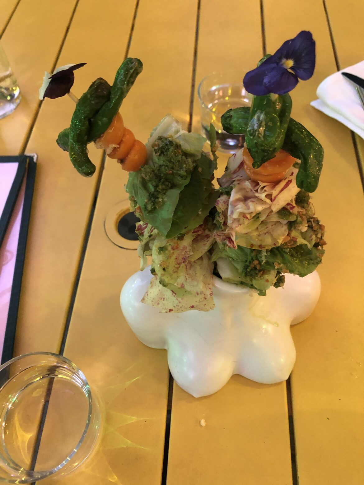2 skewers of salad in a headless titty vase ☹️
