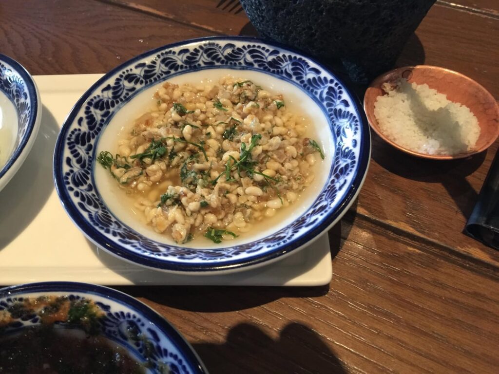 Huevos de hormiga (ant eggs) and chapulines & guac.