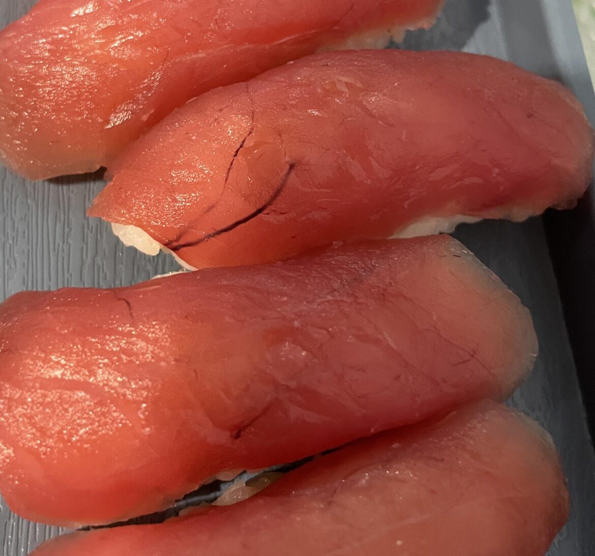 Is this normal on tuna nigiri? Please help I'm scared