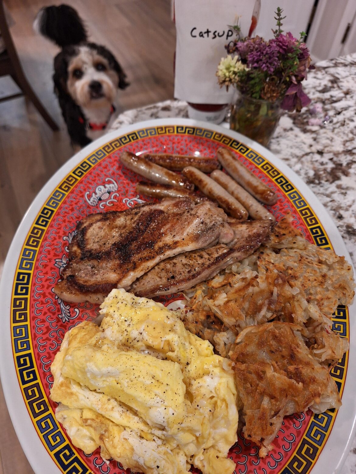 Pork steak, scrambled chicken eggs, potato browns, and sausage links [homemade]