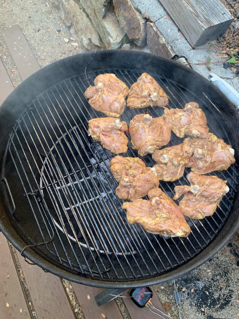 Tonight’s dinner. Mesquite lump coal in the Weber makes it taste just right!!