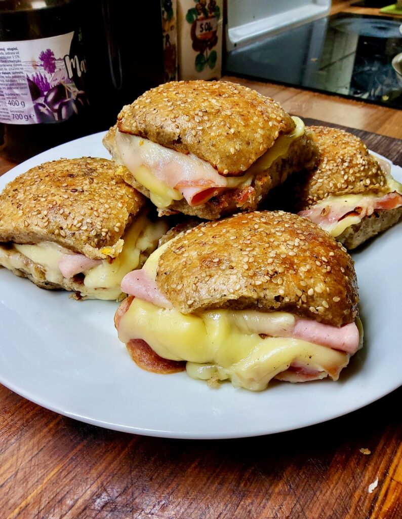 Sourdough wheat/spelt sandwiches with gouda/mozzarella, cooked and Black Forest ham, hungarian salami
