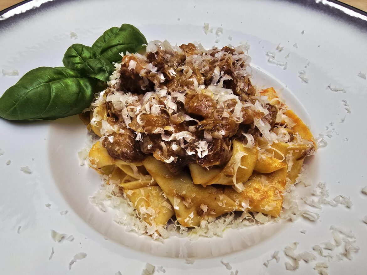 Fresh semolina pappardelle with ragu Napoletano