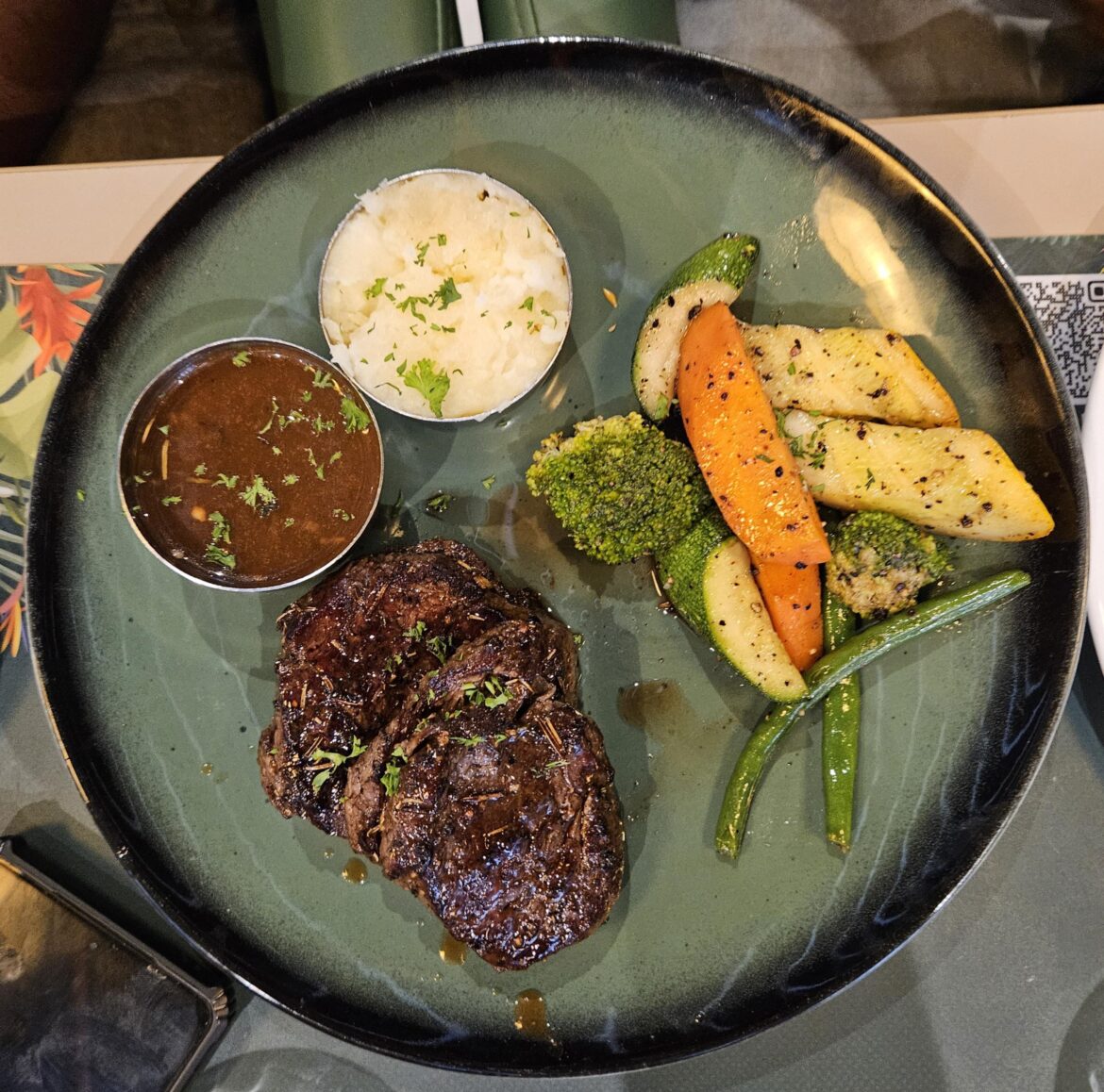 Sizziling steak with sides!