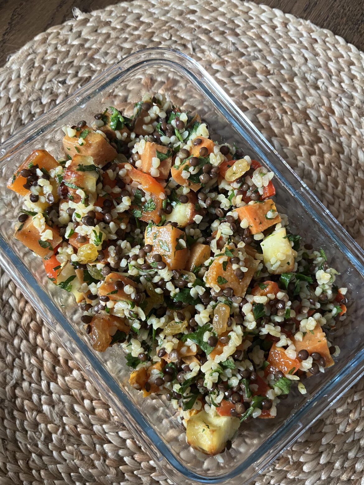 My lunch meal prep for the week: Curry roasted sweet potatoes, peppers, and halloumi with bulgur, beluga lentils, golden raisins, herbs, and a lime ginger dressing