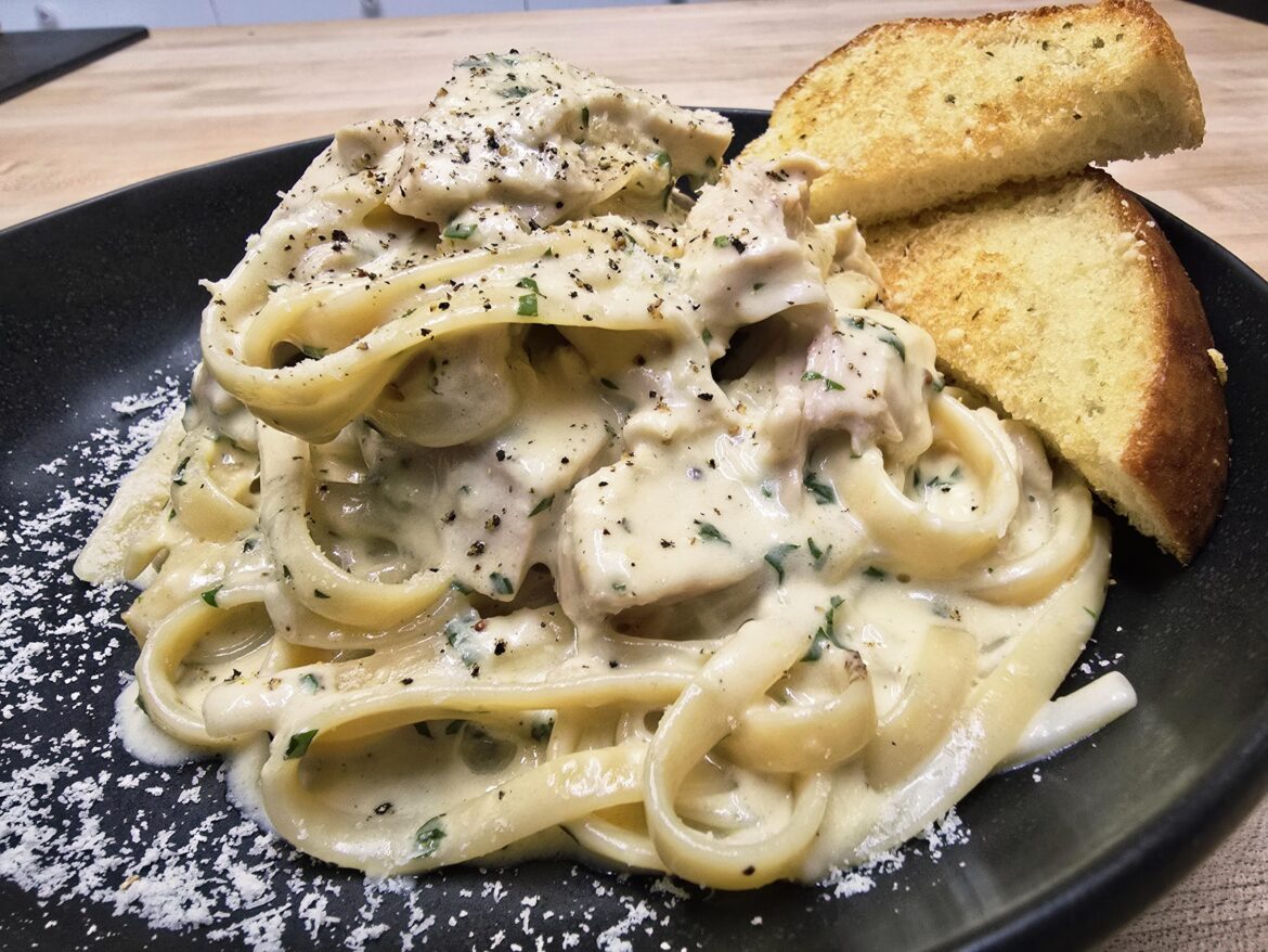 Fettucine in white wine parm sauce with roast chicken