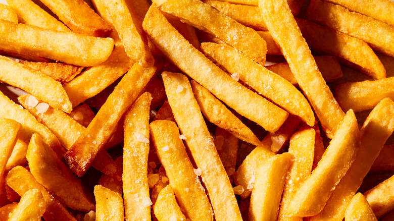 Extra-crispy fries filling the entire frame of an image