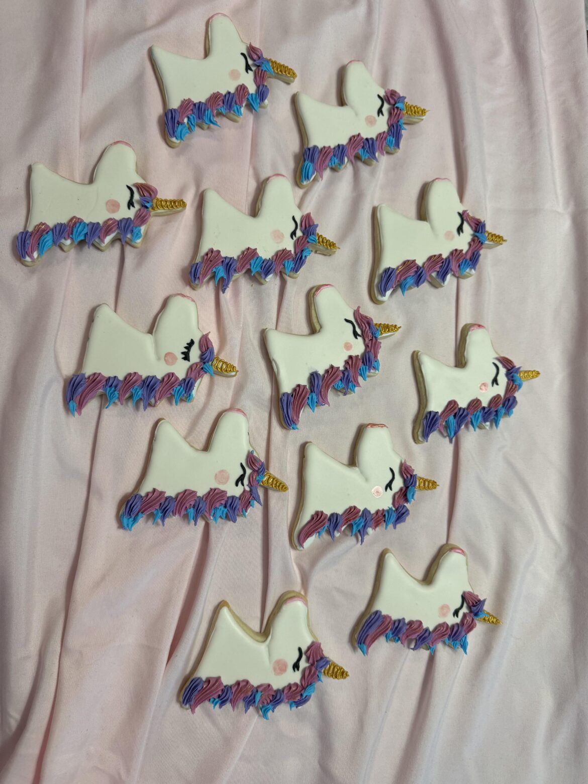 Added a few details… gold to the horns, and glittery cheeks.