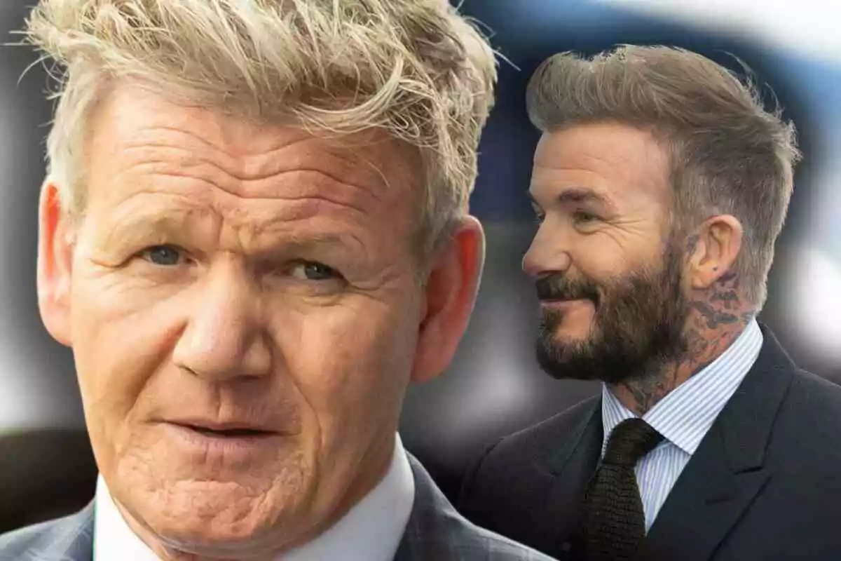 Two middle-aged men with blond hair and beards, both dressed in suits, David Beckham with visible tattoos on his neck and Gordon Ramsey in the foreground looking straight ahead.