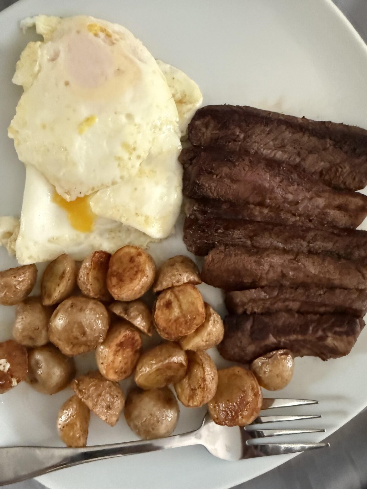 Steak and eggs with potatoes. My go to for a quick meal.