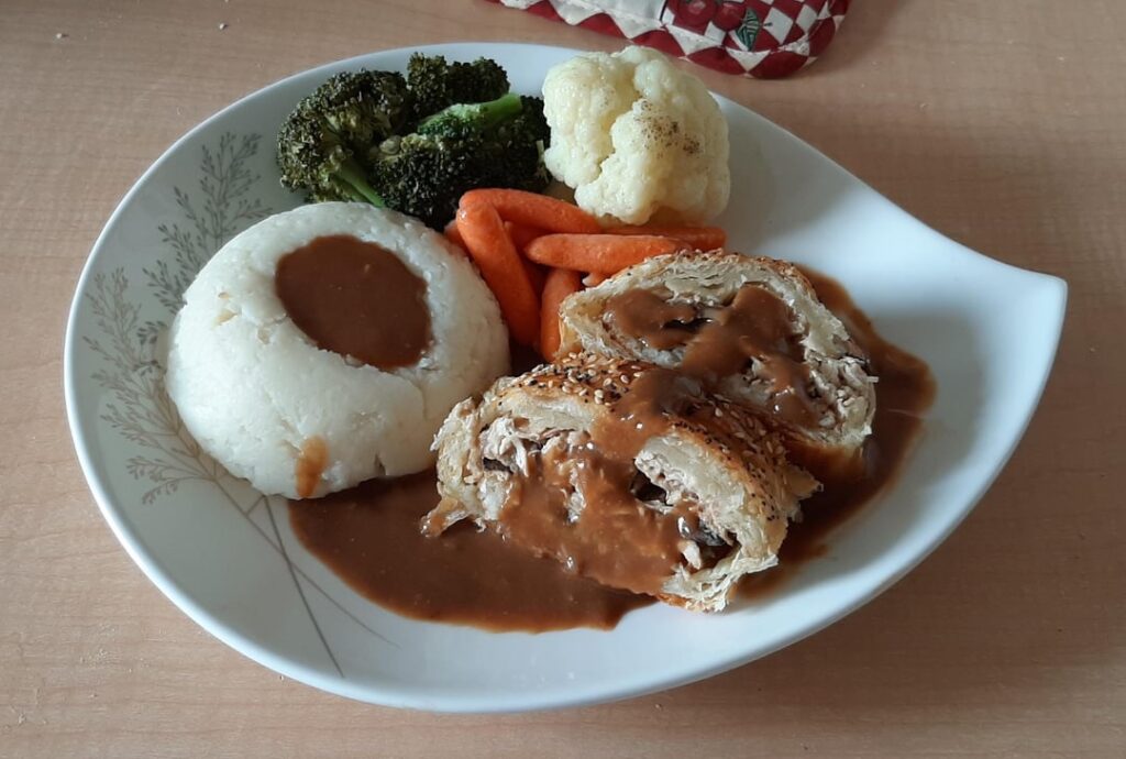 Chicken and Mushroom in Puff pastry with Mash, steamed Vegetables abd gravy