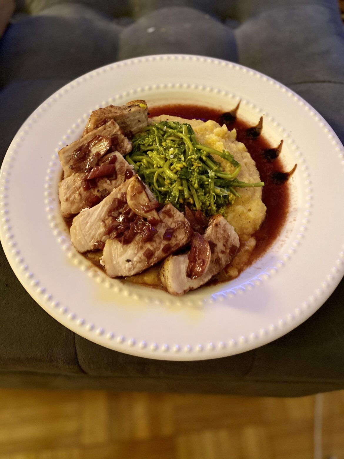Pork loin chop, red wine sauce, polenta, broccoli rabe