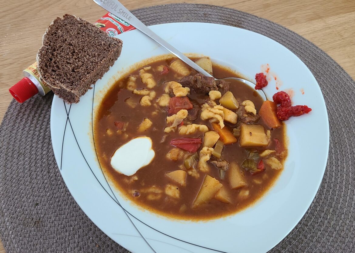 Goulash with homemade beef bone broth, rye bread
