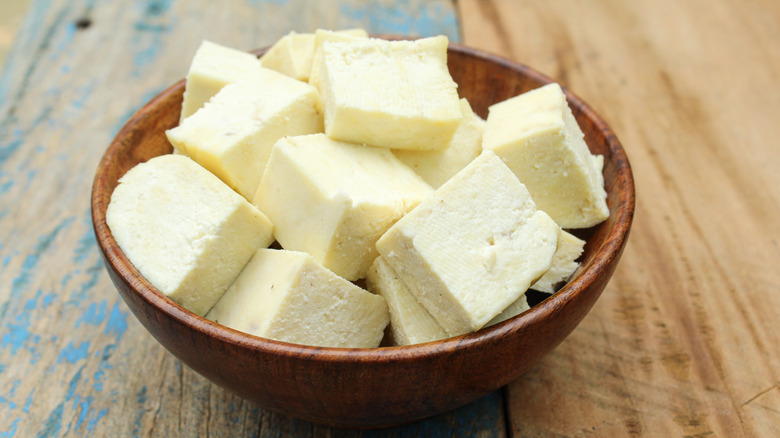 A bowl of paneer blocks