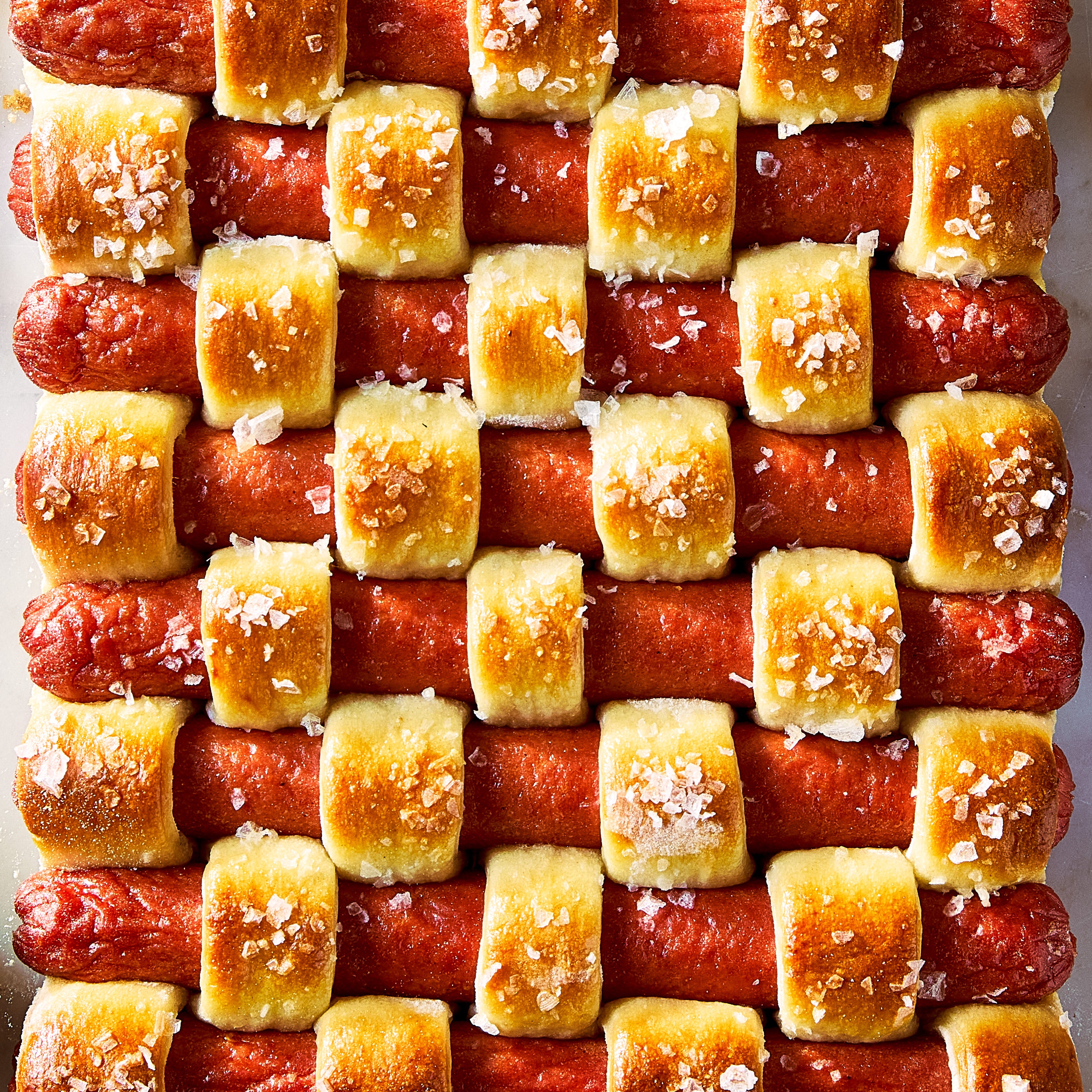 pigs in a blanket quilted with crescent dough and topped with flaky salt