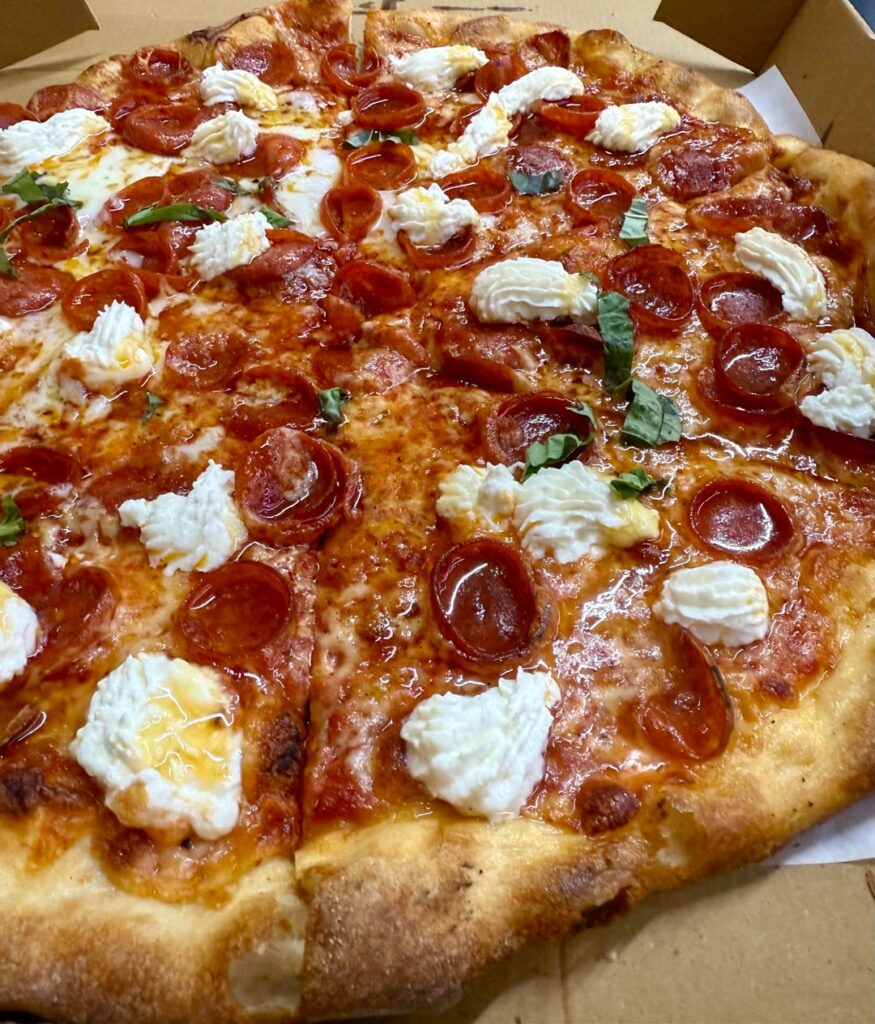 [I ate] Hot Honey Pizza in a Mexican grocery store.