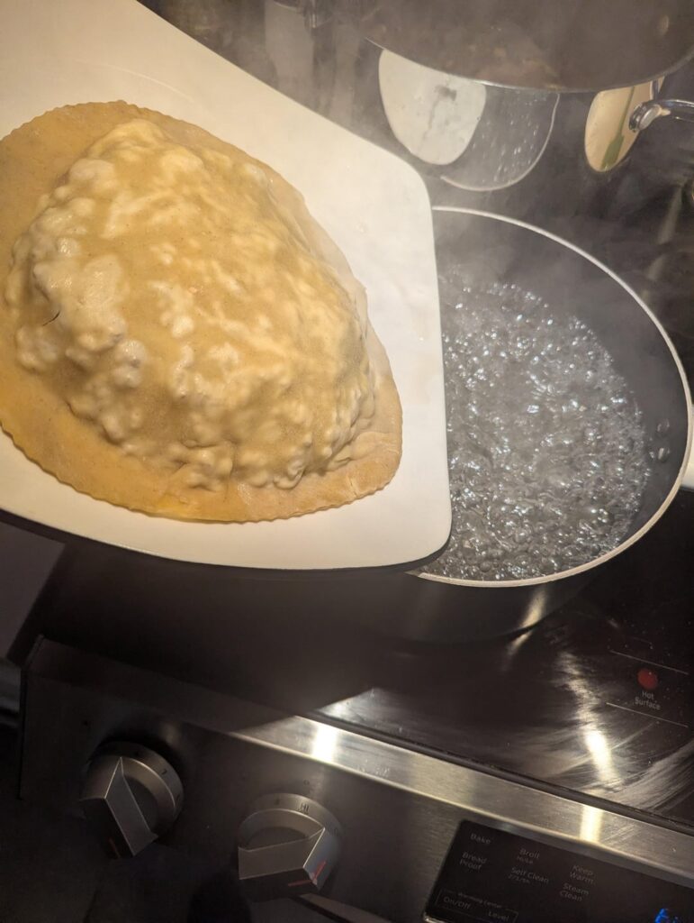 Huge ravioli filled with apple and pork.