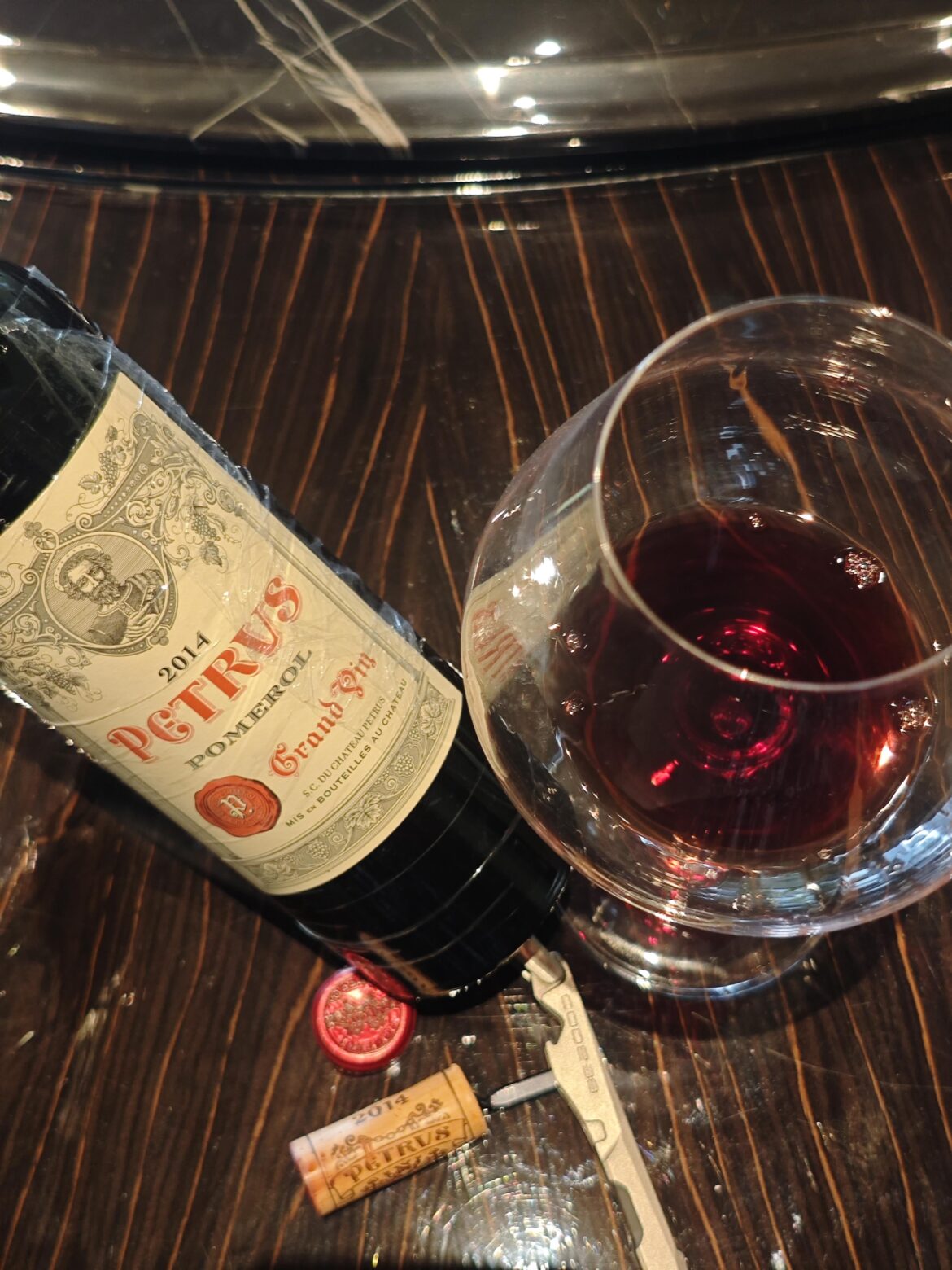 The condition is very good. Although the vintage is average, you should always trust Petrus.