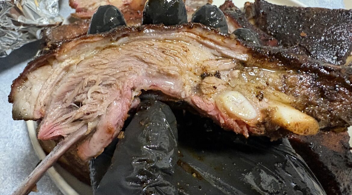 Lamb ribs on the Weber kettle, smoked with raspberry jam wood.