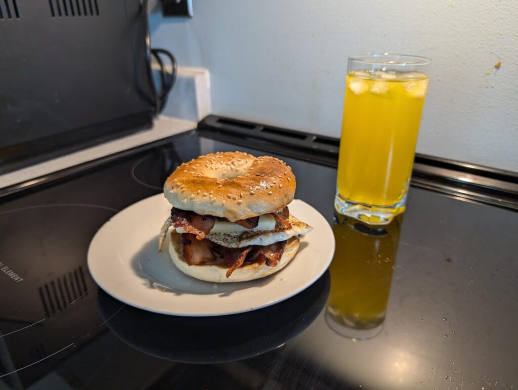 Bacon, fried egg, Balderson sharp cheddar and peanut butter sandwich in a bagel!