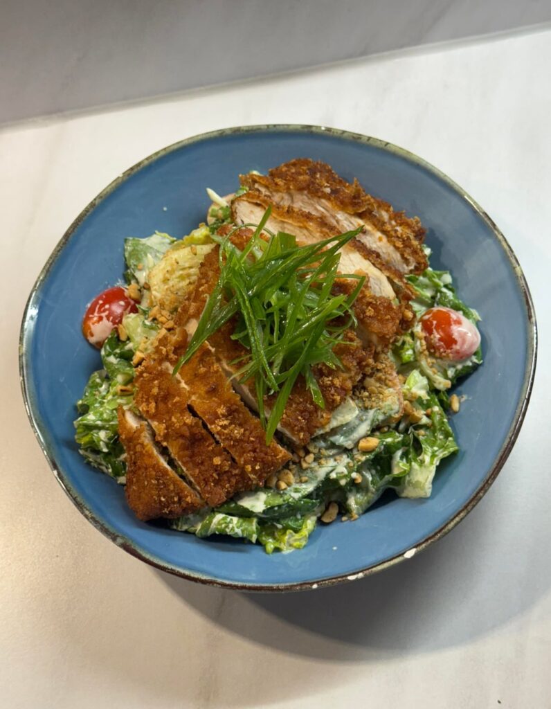 it’s a chicken salad nyeah. with a cottage cheese dressing.