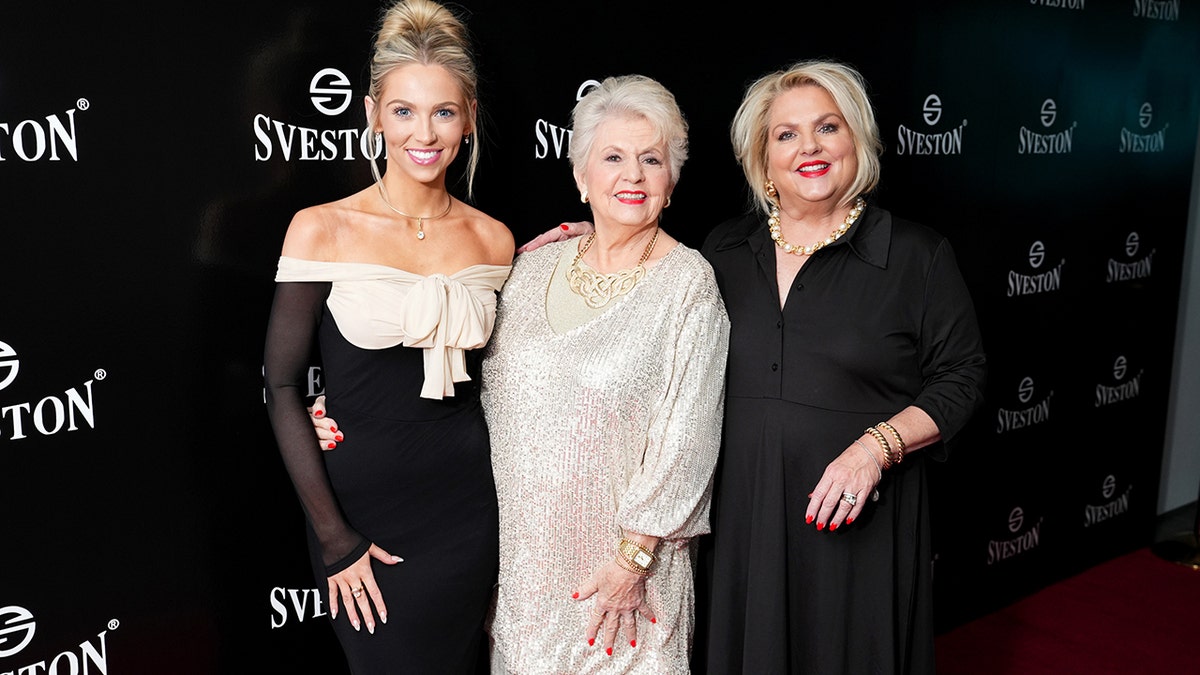 From left to right, Emma Grace Burke, Eve Anne Wall, and Sabrina Nelson Burke on red carpet while attending the Sveston U.S. Debut on September 14, 2025 in New York City during Fashion Week.