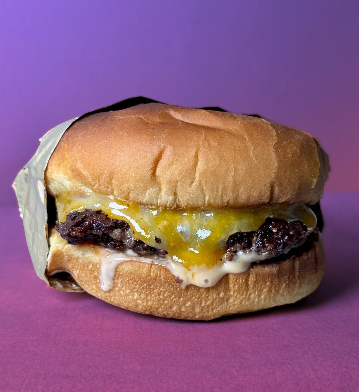 [homemade] 5 oz Wagyu burger with Colby jack, burger sauce and a potato bun.