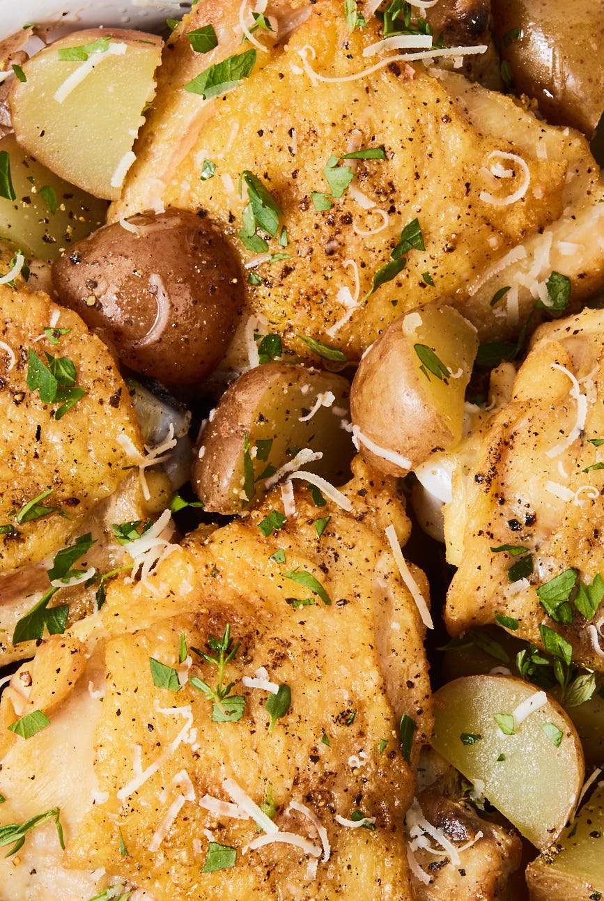 slow cooker garlic parmesan chicken with fresh herbs and potatoes