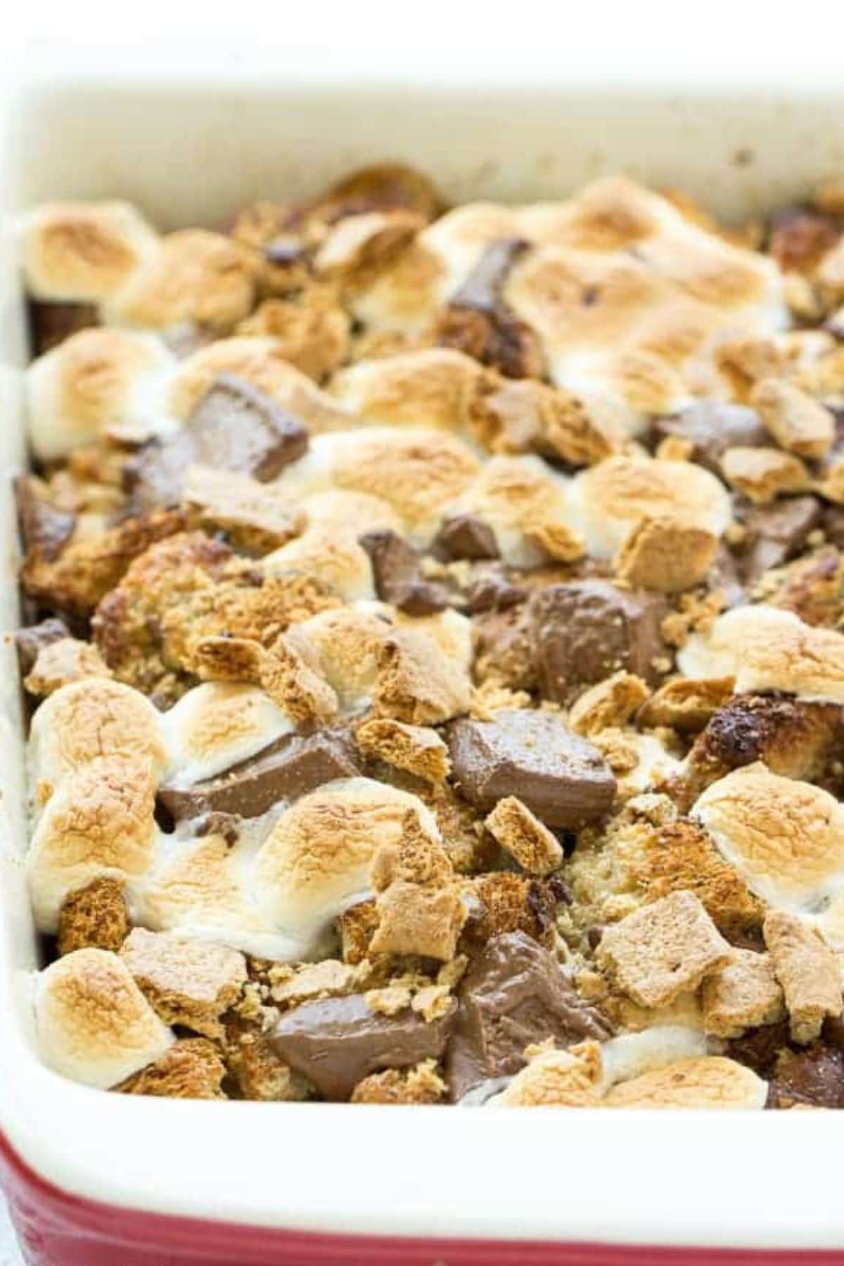 These 35 Scrumptious Make Ahead Brunch Casseroles will make your life over the holidays so much easier. Plus, everyone will be delighted with any one of these casseroles for the holidays. Smores french toast in dish.