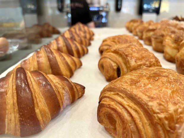 Fresh-baked croissants, left, and chocolate croissants at newly opened Christophe Rull Patisserie in the North City community of San Marcos. (Pam Kragen / The San Diego Union-Tribune)