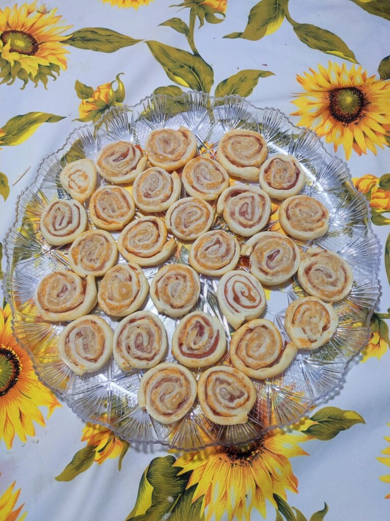 Homemade salatini. (puff pastry with raw ham and parmesan cheese)