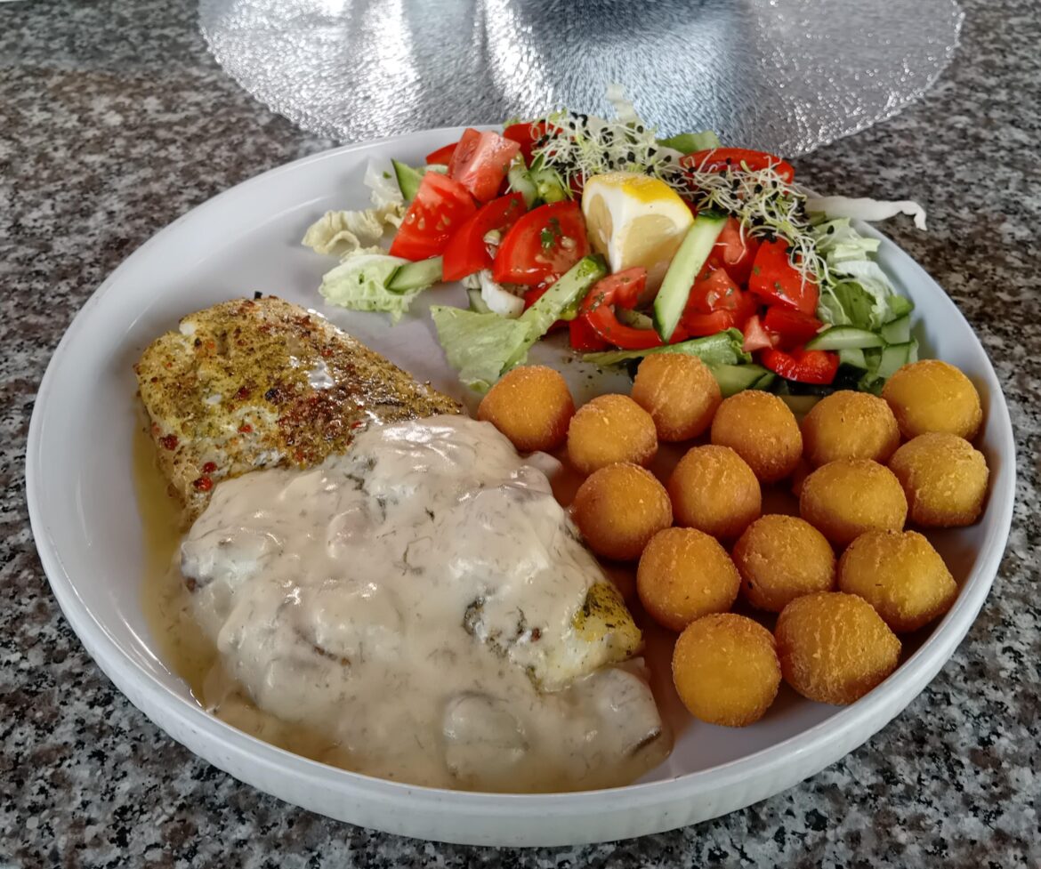 Grilled zander with boletus sauce, potato croquettes & a salad