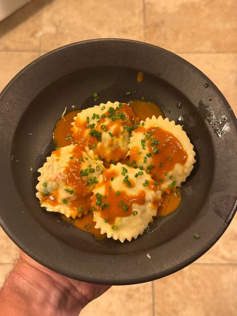 Prawn ravioli with prawn bisque