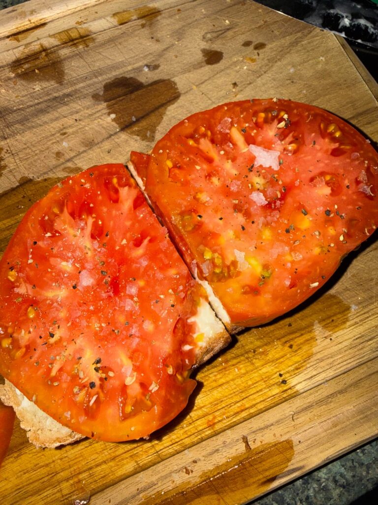 Homemade bread, home grown Pink Brandywine. Open face counts