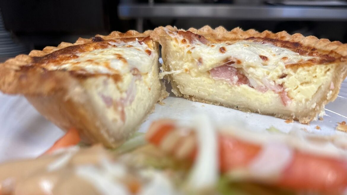 Quiche options are endless after crust, eggs, milk and cream Looking over the salad to the Quiche Lorraine, from Voilá-Merci French Bakery and Bistro in Indian Shores. Photo by Virginia Johnson/Staff