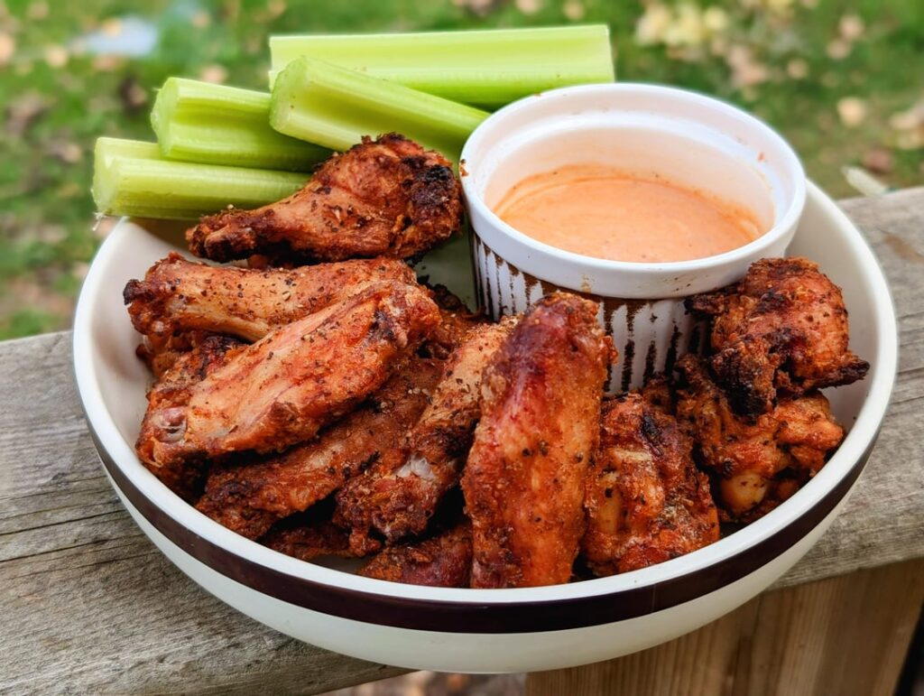 Hottest hot wings I've made so far with ghost peppers from the garden