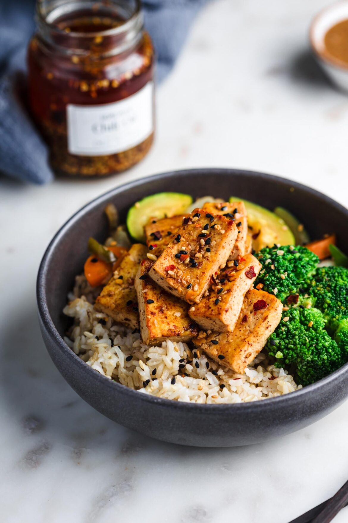 One of my go-to dinner: Almond butter garlic tofu bowl with chili oil