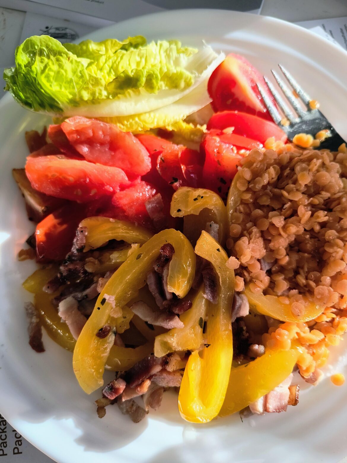 Tomatoes, peppers, bacon and lentils