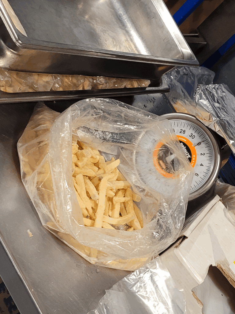 So, this is a first for me. Portioning frozen fries... management to kitchen bureaucracy continues to amaze me