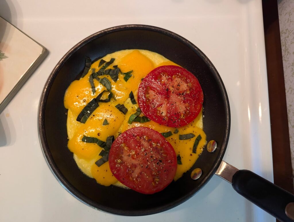 Breakfast for dinner with basil and tomatoes from the garden.