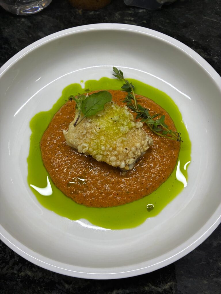Red snapper, romesco, dill oil, dehydrated tapioca crisp