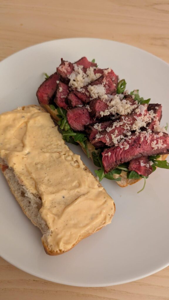 [I made] a ciabatta with sirloin steak, Dijon mayonnaise, arugula, and horseradish