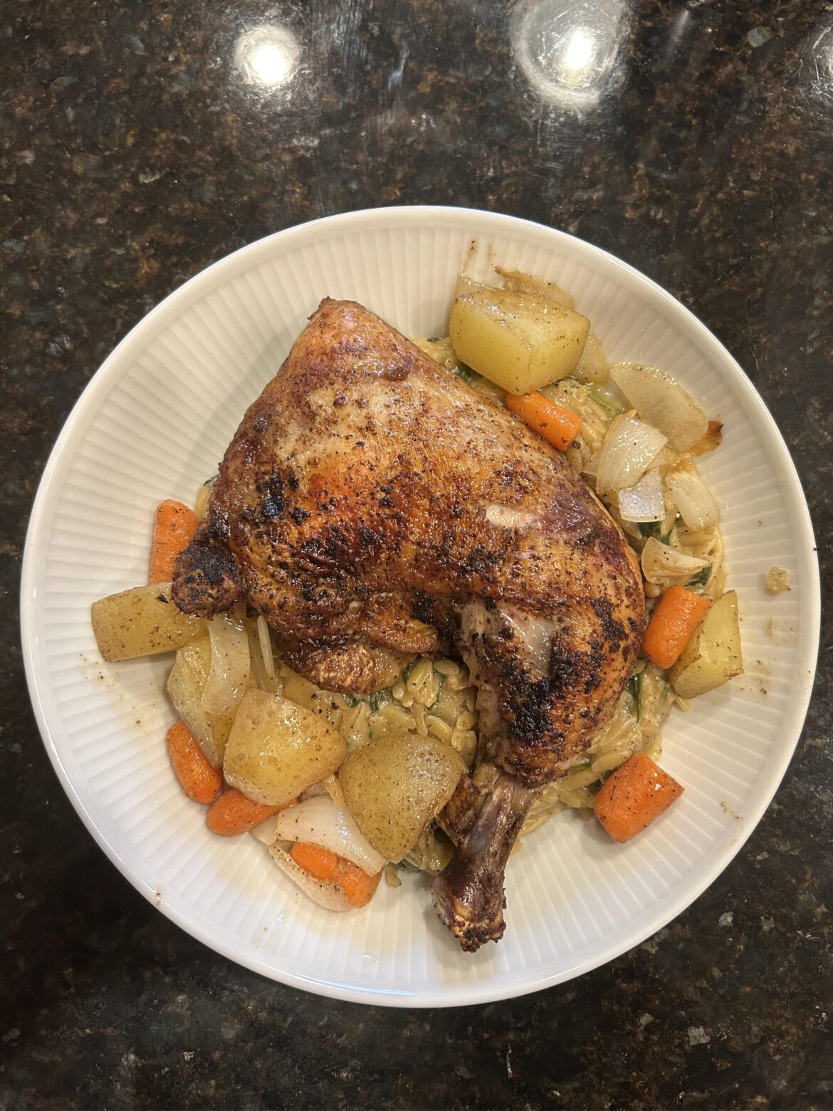 Roast chicken and veggies over orzo. My wife made me write the recipe down as soon as she took a bite!