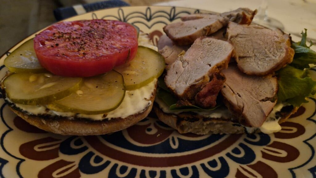 I made the ciabatta, grew the tomato and the cucumbers (made into pickles, and made the mayo. Meat is pork.