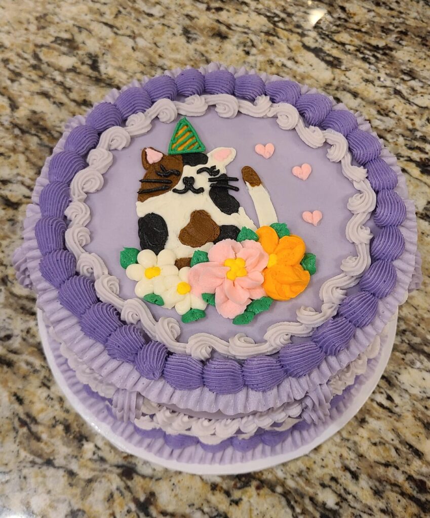 Cake for my niece's birthday today 💗 She asked for a calico cat in a party hat 😄 And purple 💗
